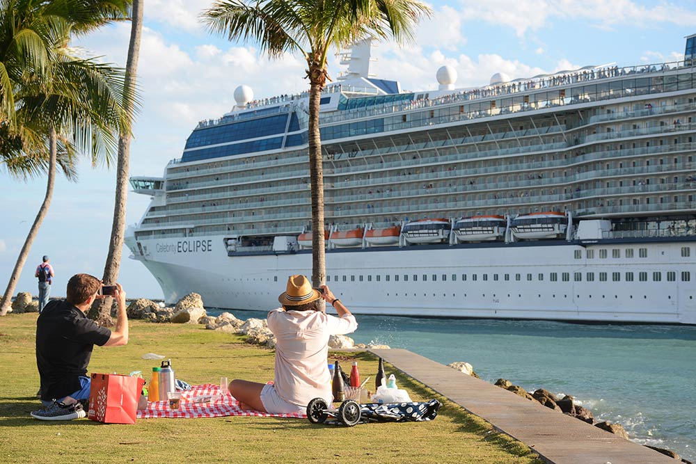 Couple watching cruise ship at South Pointe Park